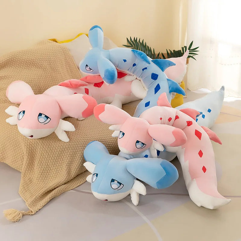 Pink and Blue Giant Chillet Plush Toys lying on the sofa.